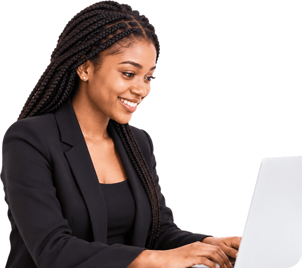 An operations manager working at a laptop